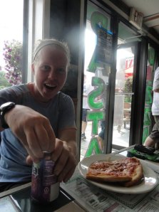 Adventure Girl enjoying trail magic: Fanta and pizza.